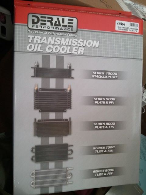 1994 Ford Bronco - Derale Performance transmission oil cooler product packaging illustrating stacked-plate, plate-and-fin, and tube-and-fin series.