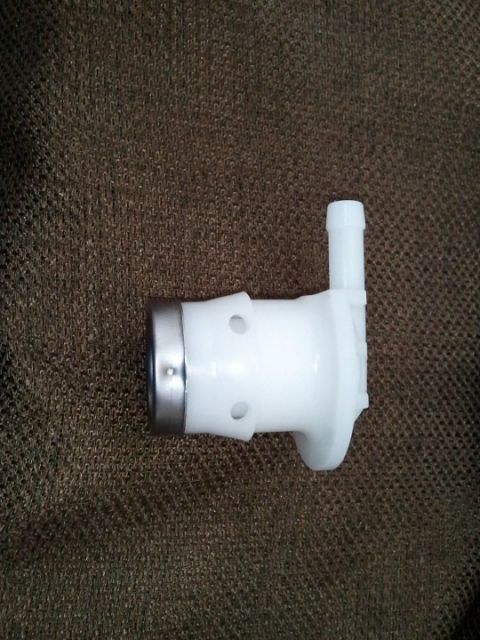 1994 Ford Bronco - This is a plastic fuel tank fitting with a metal collar and barbed hose connectors.