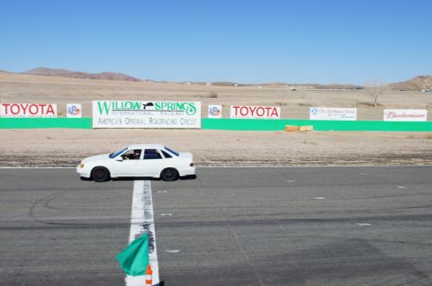 1995 Ford Taurus - White 1995 Ford Taurus on the track at Willow Springs International Raceway.