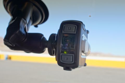 1995 Ford Taurus - A dashboard camera displays '6.76' while mounted to a vehicle's windshield, with a blurred outdoor scene in the background.