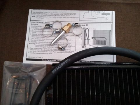 1994 Ford Bronco - Transmission cooler installation instruction sheet with numbered mounting steps and reference diagrams.