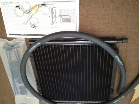 1994 Ford Bronco - Transmission cooler kit includes hoses and mounting hardware, along with installation instructions and diagrams.
