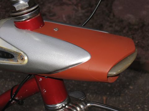 1994 Ford Bronco - Close-up of a bicycle's front end, showing handlebars and a decorative fairing.