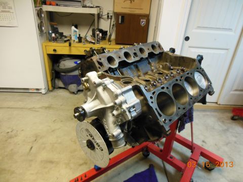 1979 Ford F-150 - An engine block is shown on a stand in a garage, with a timing dial attached.