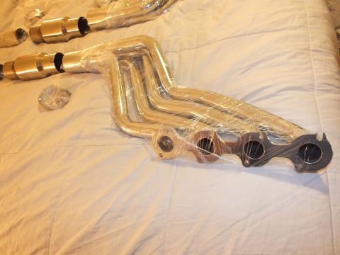 2003 Ford Crown Victoria - Polished stainless header with four-cylinder flange and merged primary tubes, wrapped on a bed