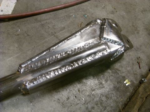 1967 Ford F-250 - A close-up view of a fabricated metal part, showing extensive welding.