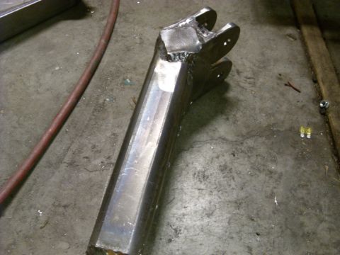 1967 Ford F-250 - A fabricated metal part with a rough, welded finish is shown on a workshop floor.