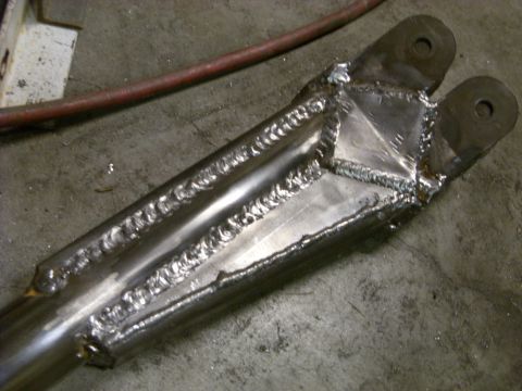 1967 Ford F-250 - Close-up of a custom-welded metal component, likely for a vehicle build.