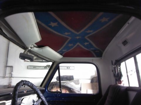 1967 Ford F-100 - View from inside a truck cab shows a custom headliner a confederate flag design.