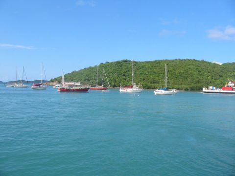 1992 Ford Bronco - Boats at anchor in a tropical bay under a clear blue sky.