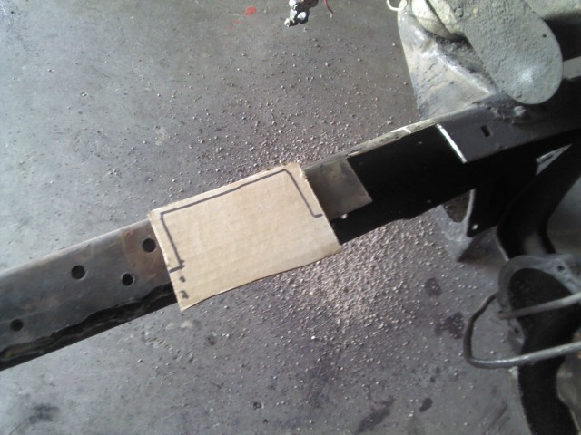 Frame section with paper template marked for cutting
