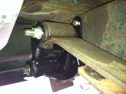 1996 Ford Bronco - This photo shows the underside of a vehicle, focusing on the rear leaf spring mounting hardware.