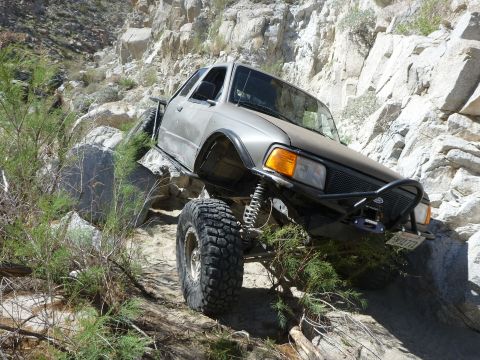 1997 Ford Ranger - This modified 1997 Ford Ranger navigates a challenging rocky trail in a desert environment.