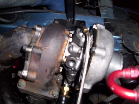 1995 Ford Probe - This image shows a turbocharger assembly, not a 1995 Ford Probe.