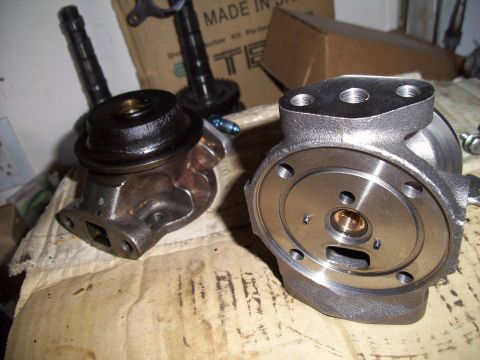 1995 Ford Probe - Comparison of an old and new oil pump, likely for a vehicle repair or maintenance project.