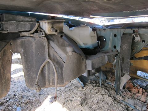 1991 Ford LTD Crown Victoria - Close-up view of the engine bay of a 1991 Ford Crown Victoria LTD, showing various components and wiring.