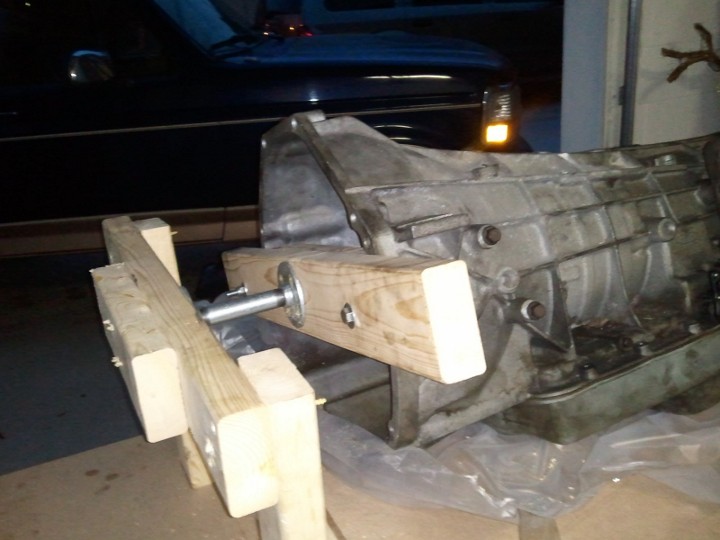 Transmission housing supported by a wooden jig