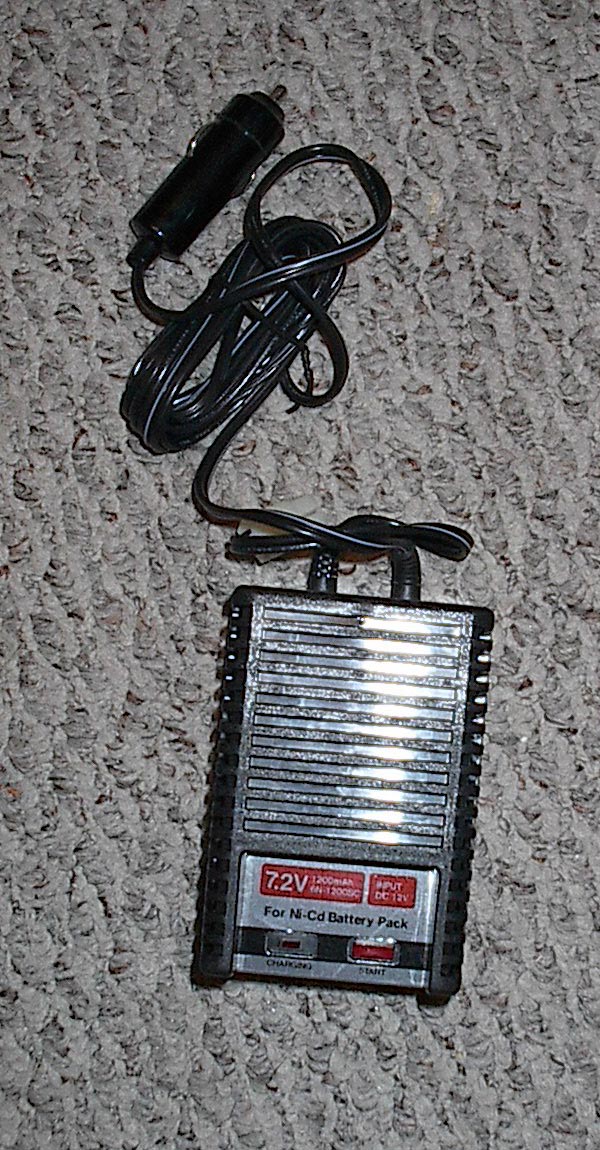 Car charger with coiled cord and a 7.2V Ni-Cd battery pack charger