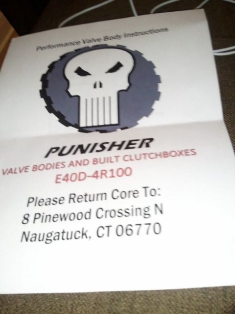1994 Ford Bronco - Title/cover page of Punisher performance valve body instruction packet with logo and core-return mailing address.