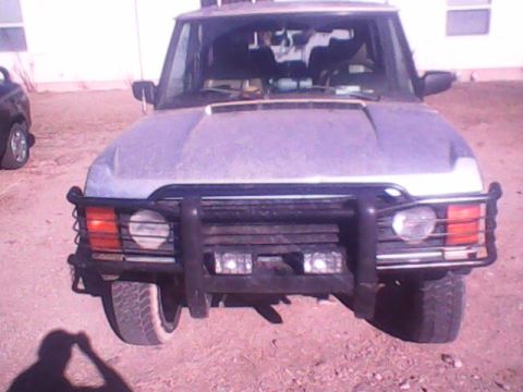 1991 Land Rover Range Rover - Front view of a silver 1991 Land Rover Range Rover, equipped with a protective bull bar.