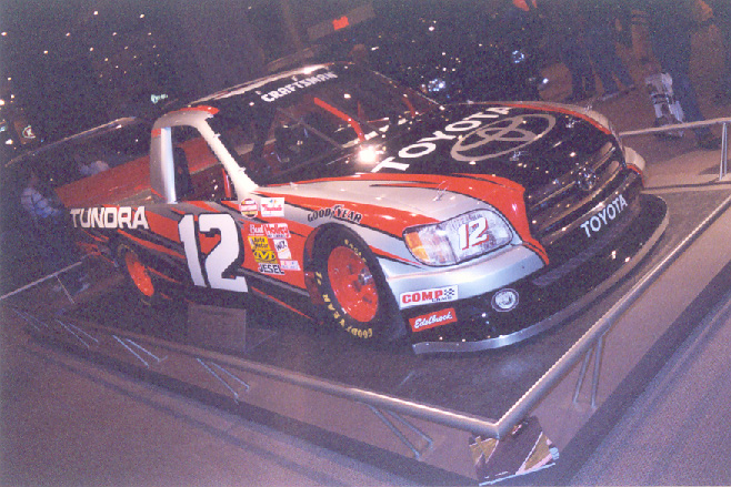Toyota Tundra race truck with number 12 and sponsor decals