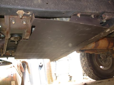 1983 Ford Bronco - A flat plate with the stock skidplate mounts welded on, and a couple of ribs up the middle. It underhangs the front (trans) crossmember and…