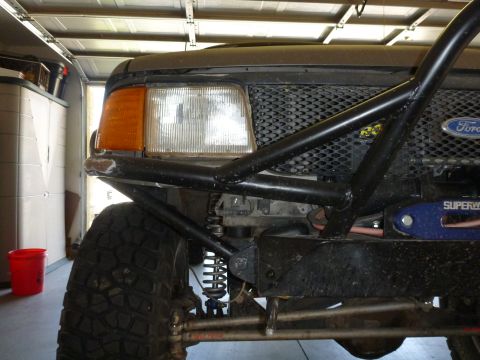 1997 Ford Ranger - Front view of a 1997 Ford Ranger with a custom bumper and winch, showing the Ford badge.
