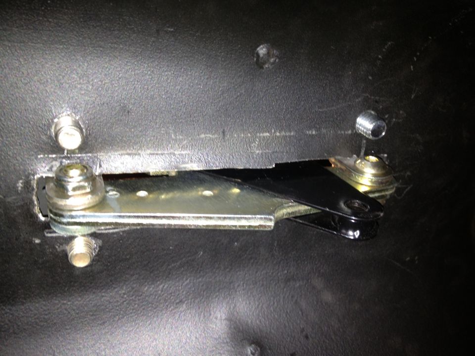 65 Mustang with Lokar hand brake.  L mounts with welded nuts in between floor pan and one piece seat pan