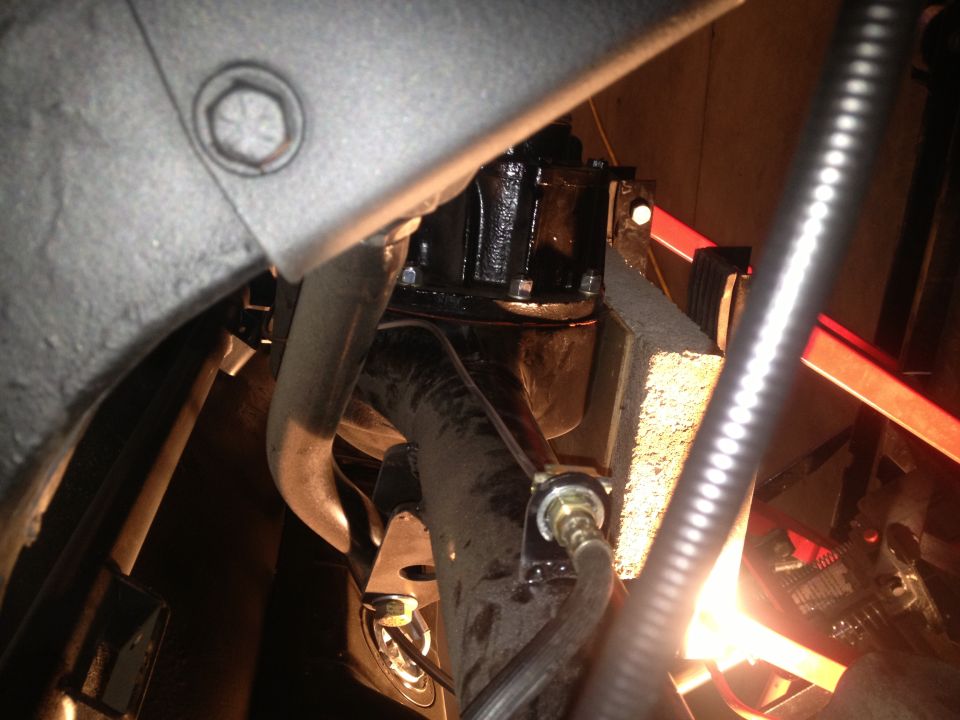 65 Mustang with cadillac metric calipers, brake tab welded to front of axle,  brake line passenger side