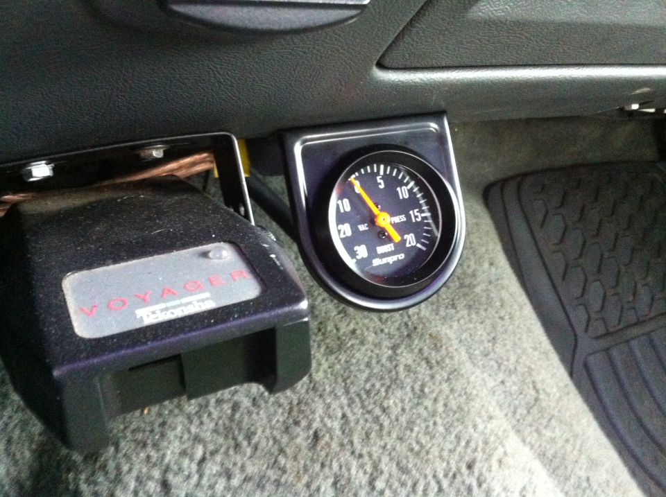 All mounted up and functional. I wired the power for its light into the ashtray light.