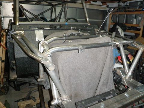 1961 International Scout 800 - Custom roll cage fabrication in progress, showing welded tubing and mounting points.