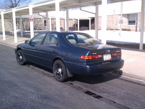 1998 Toyota Camry - The rear view of a 1998 Toyota Camry shows its taillights and license plate.