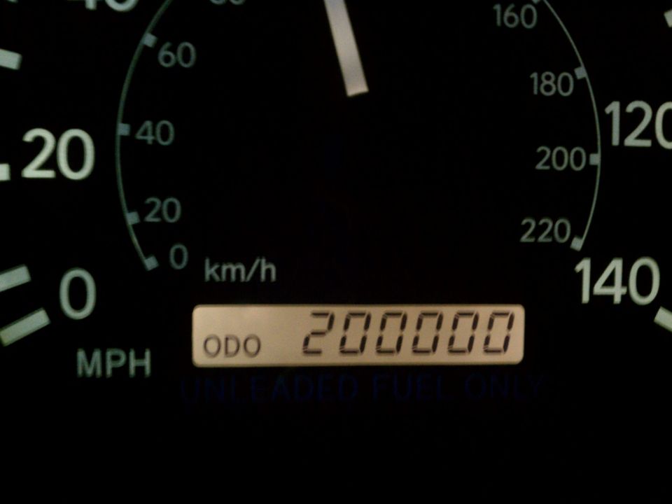 Odometer showing 200000 miles with speedometer in background