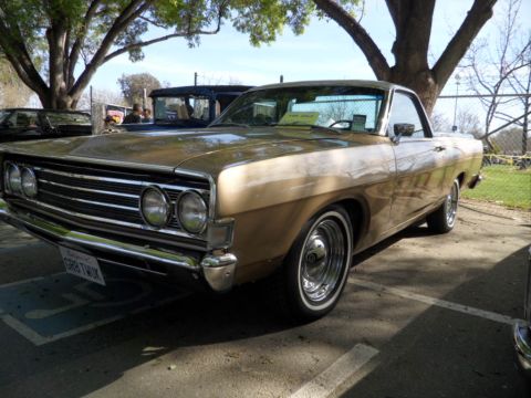 1973 Ford Ranchero - This 1970 Ford Ranchero is parked in a lot, with another vehicle behind it.