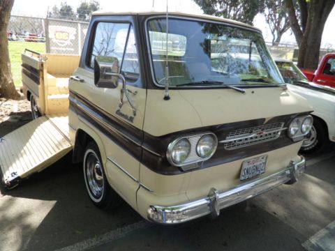 1973 Ford Ranchero - This vintage Chevrolet Corvair pickup features a unique ramp system for loading cargo.