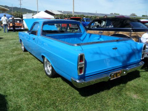 1973 Ford Ranchero - Blue 1973 Ford Ranchero pickup truck at a car show, seen from the rear.