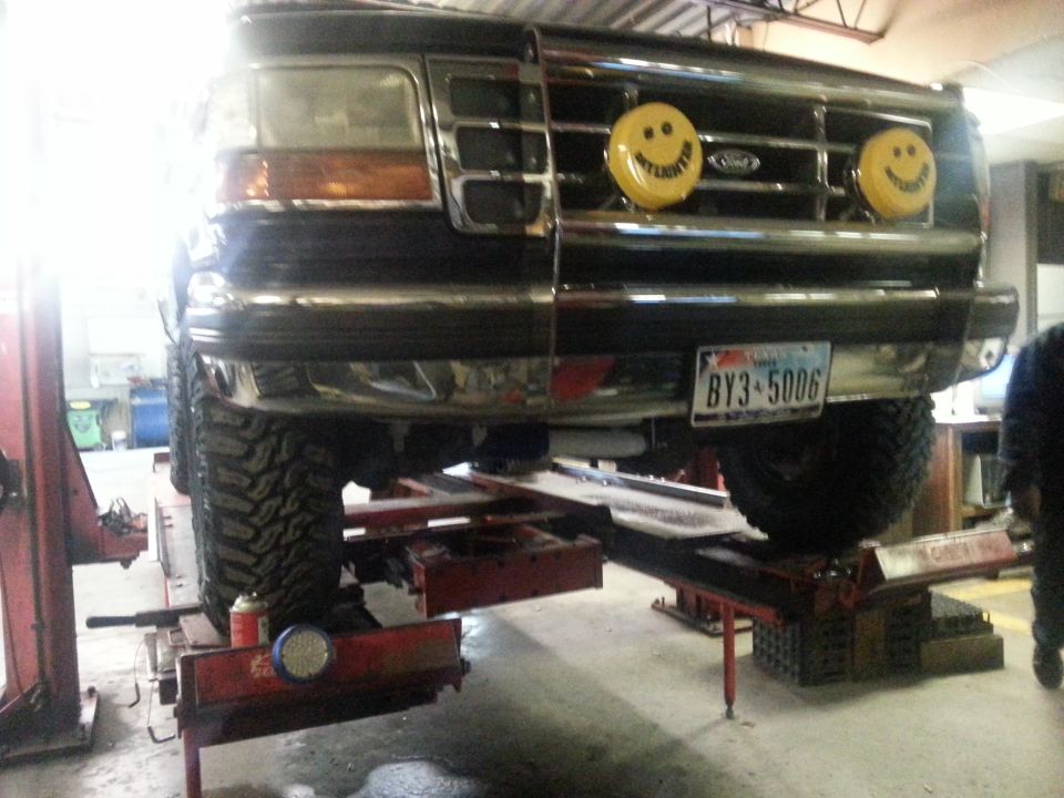 1995 Ford Bronco front view with smiley face lights and custom license plate BY3-5006