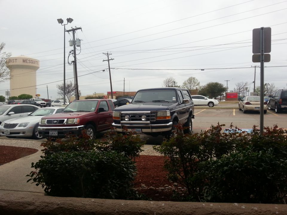 Dark blue 1995 Ford Bronco 3q front view in parking lot