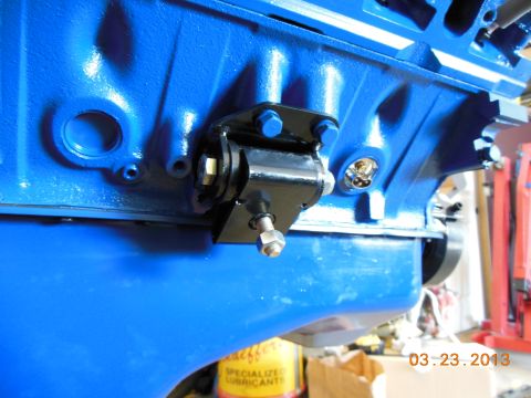1979 Ford F-150 - Close-up of an engine block showing a motor mount attachment point and part of the oil pan.
