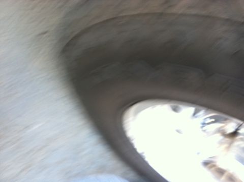 1996 Ford Bronco - The image shows a portion of a vehicle's wheel well and tire, with a watermark from Supermotors.net.