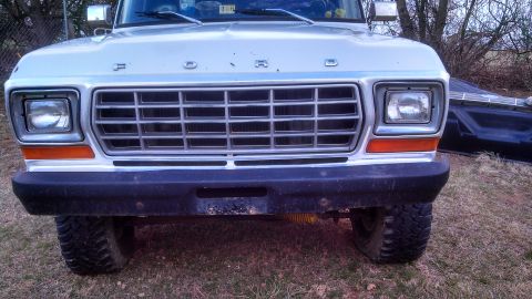 1979 Ford Bronco - Front view of a 1979 Ford Bronco, showing the iconic grille and headlights.