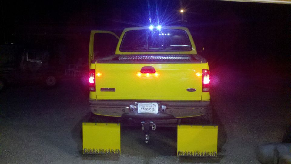 921 BULB WHITE LED CARGO LIGHTS, & 5-3/4 INCH RED LED LIGHTS ON THE TAILGATE & 192 BULB WHITE LEDS ON THE LICENSE PLATE.
