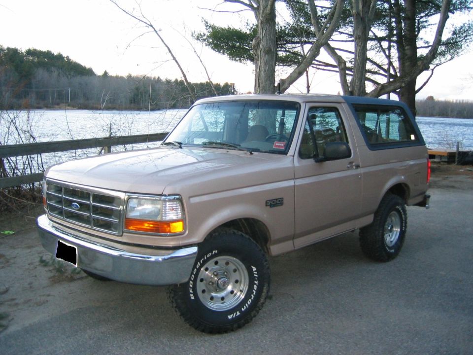 Tan 1996 Ford Bronco 3q-front view