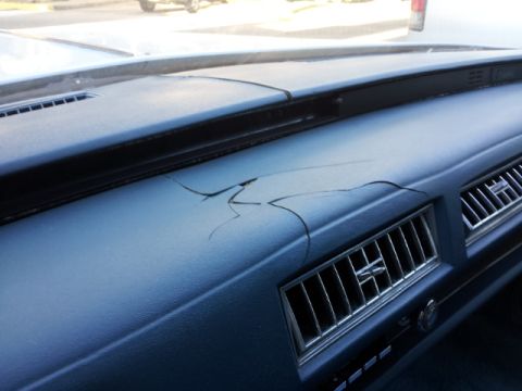 2008 Subaru Legacy - Dashboard interior shows significant cracking on the surface.