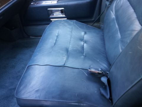 2008 Subaru Legacy - Interior view of a car seat with a seatbelt buckle visible.