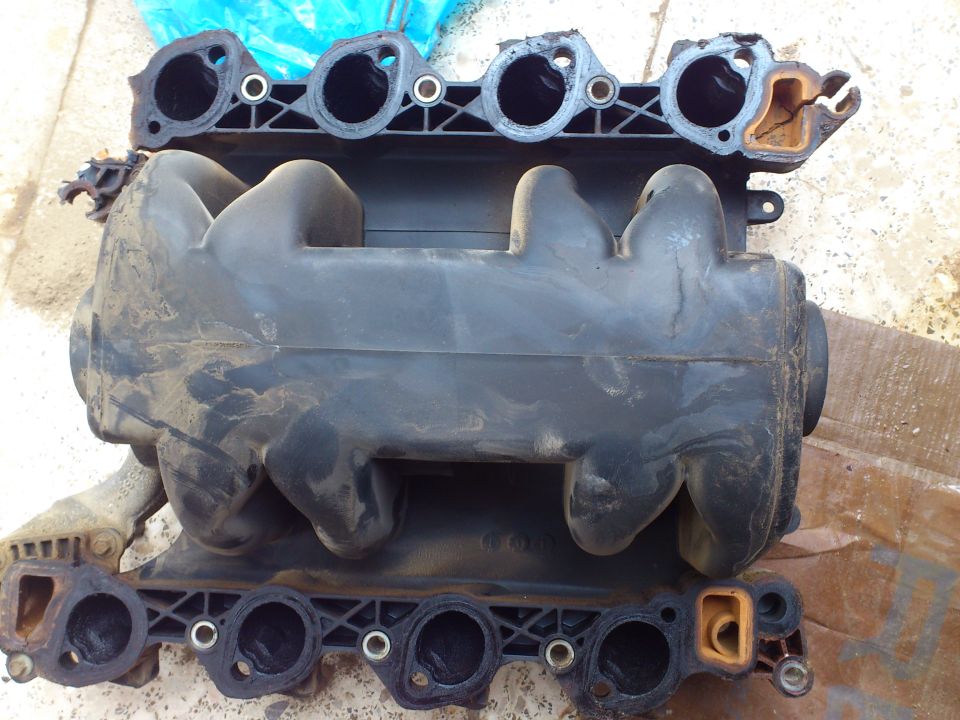 Ford Crown Victoria plastic intake manifold with gaskets removed