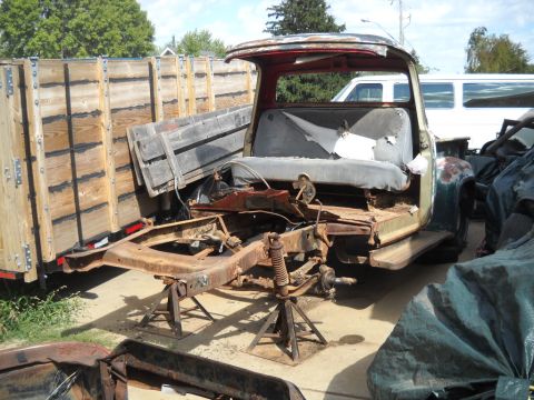 1954 Ford F-100 - 9-8-2012: Today I pulled the front brakes and hubs. I also got all the garbage cleaned off the cab floor.