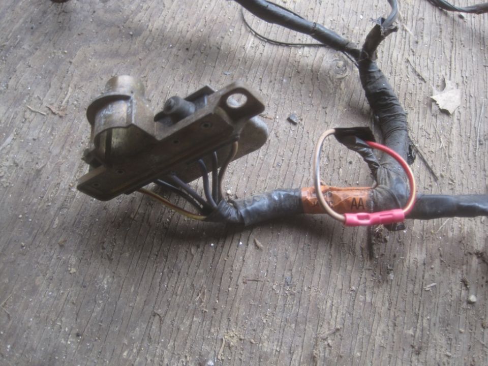 Lock cylinder switch. I'm pretty sure the spliced wire is to bypass the latch closed lockout, can't remember. Either way, the window worked fine from the dash switch.