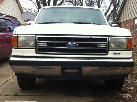 1990 Ford F-150 - Frontal view of a white 1990 Ford F-150 pickup truck.