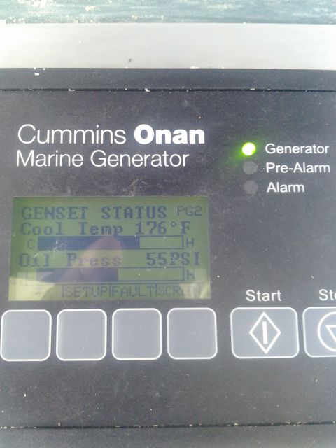 1991 Ford Bronco - Control panel for a Cummins Onan Marine Generator displays current operating status, including coolant temperature and oil pressure.